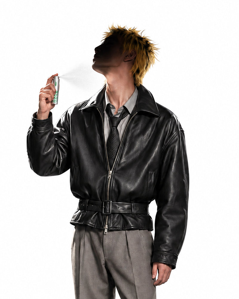 Model spraying the NBDY refillable atomiser at his neck