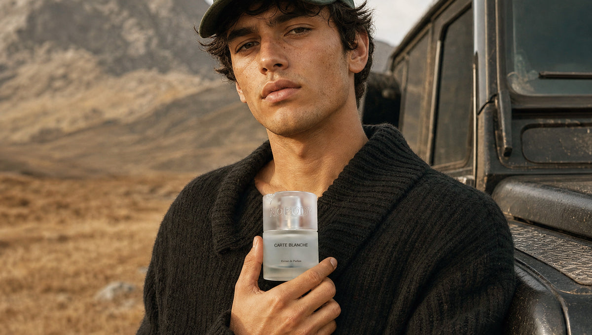 Model holding Carte Blanche